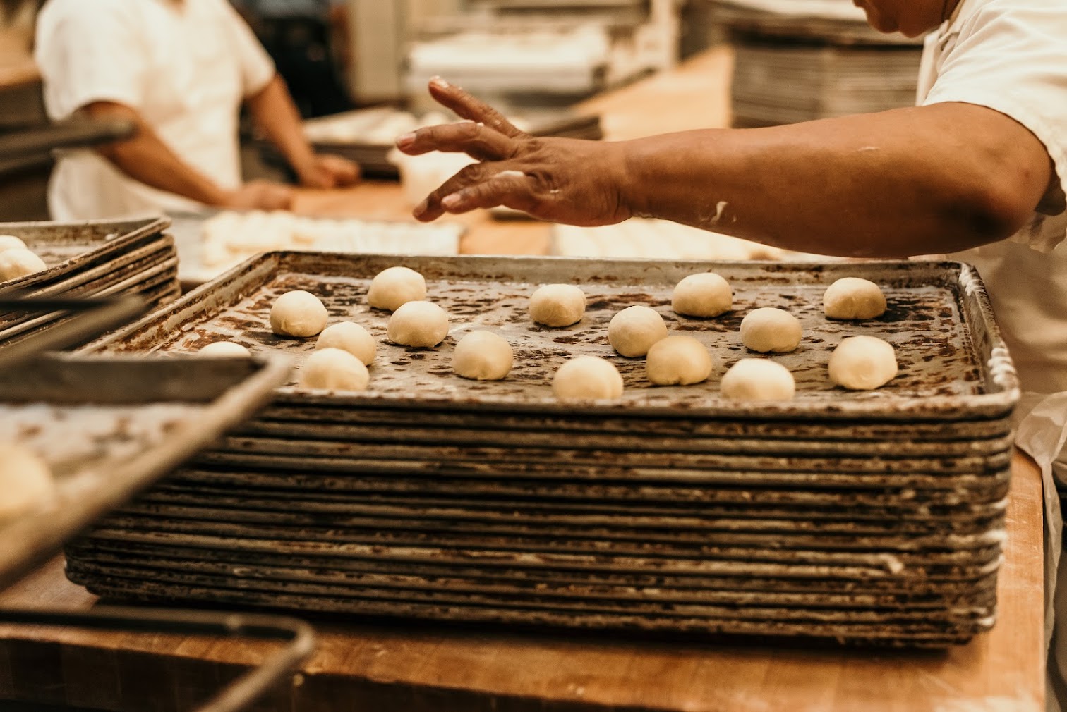 Concha dough balls on baking sheet